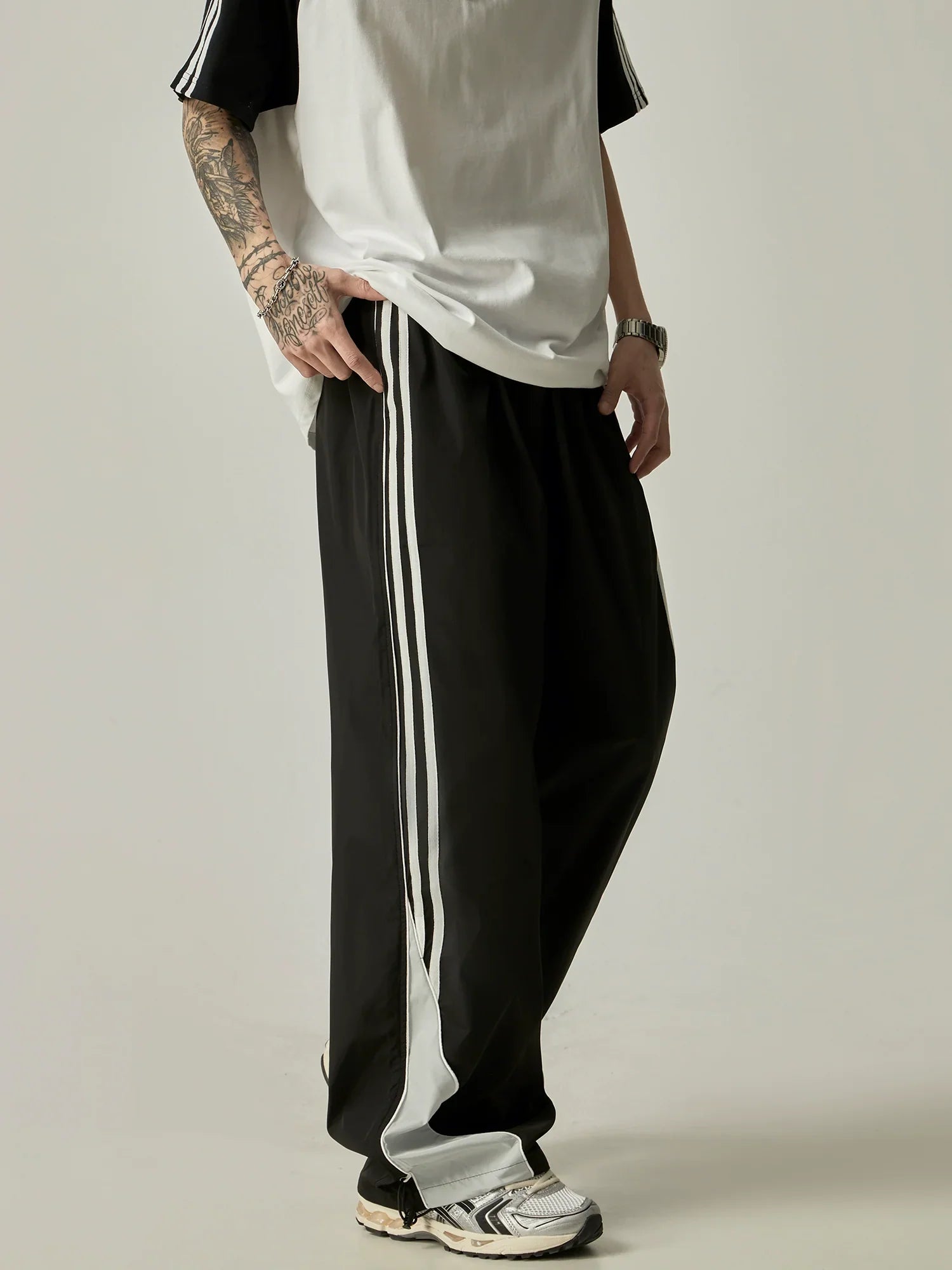 Wide-Leg Triple Stripe Track Pants sneakershuborg