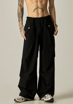 Wide-Leg Black Cargo Pants - Close-up View sneakershuborg