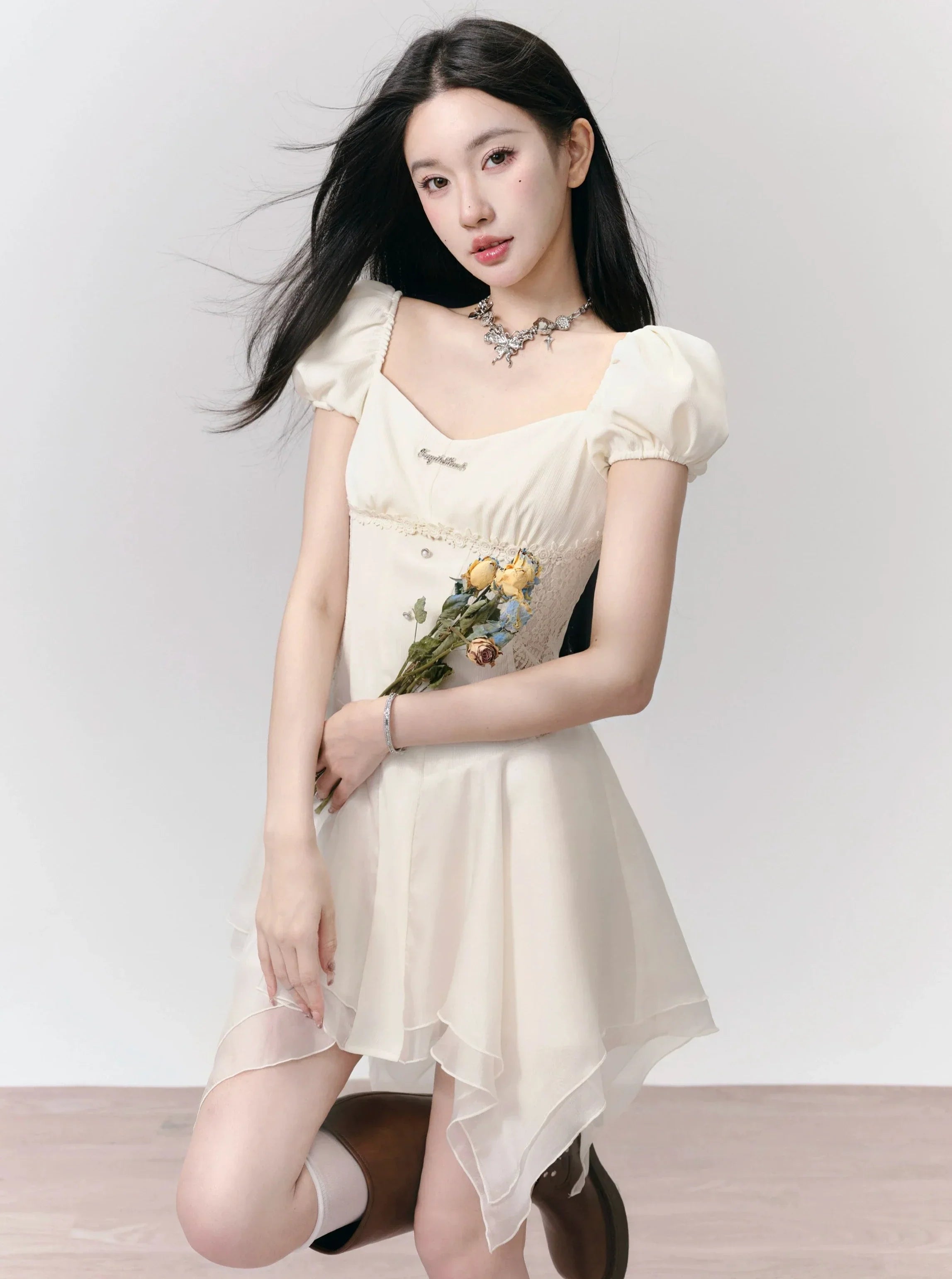 Romantic White Puff Sleeve Mini Dress - Corset-Style Bodice with Handkerchief Hem sneakershuborg