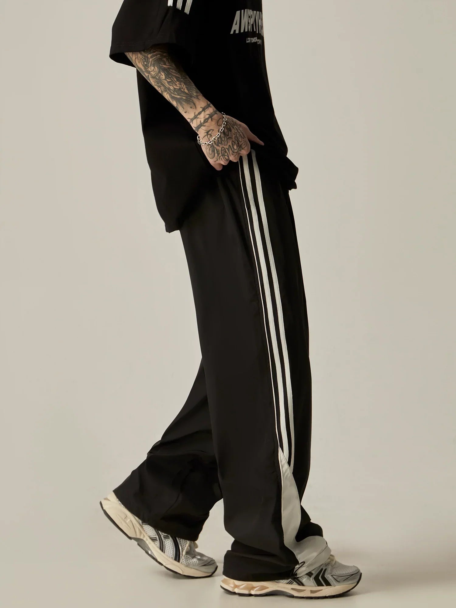 Wide-Leg Triple Stripe Track Pants sneakershuborg