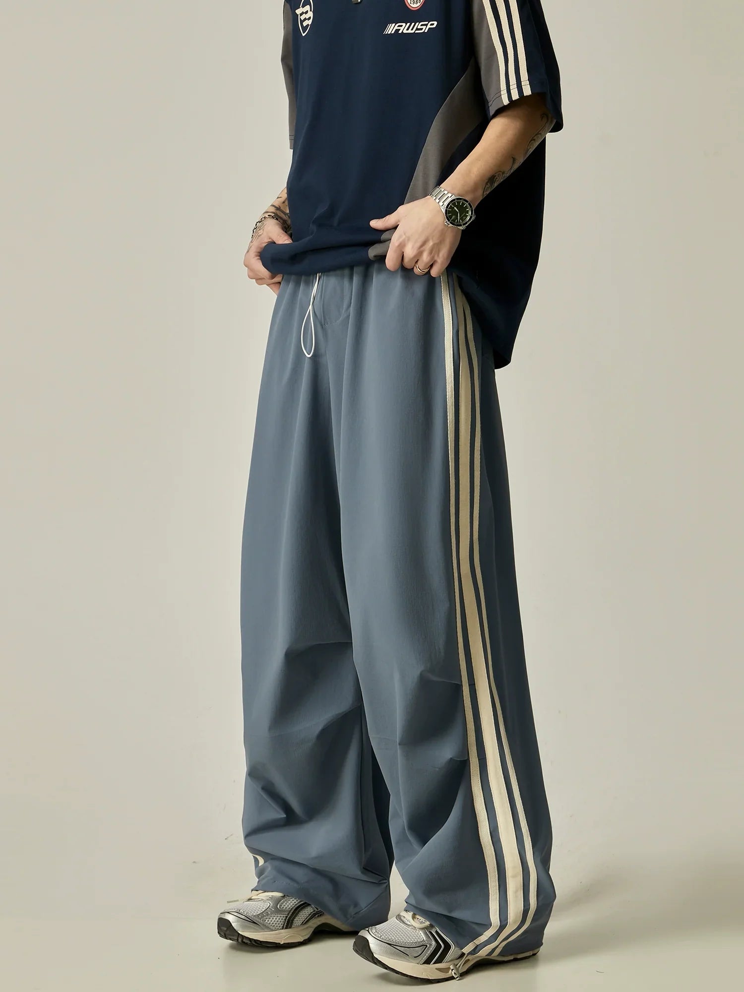 Wide-Leg Triple Stripe Athletic Pants sneakershuborg