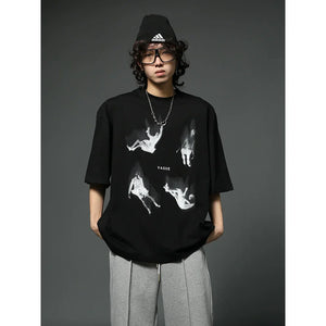 Oversized Black Graphic T-Shirt with Floating Figures Print sneakershuborg