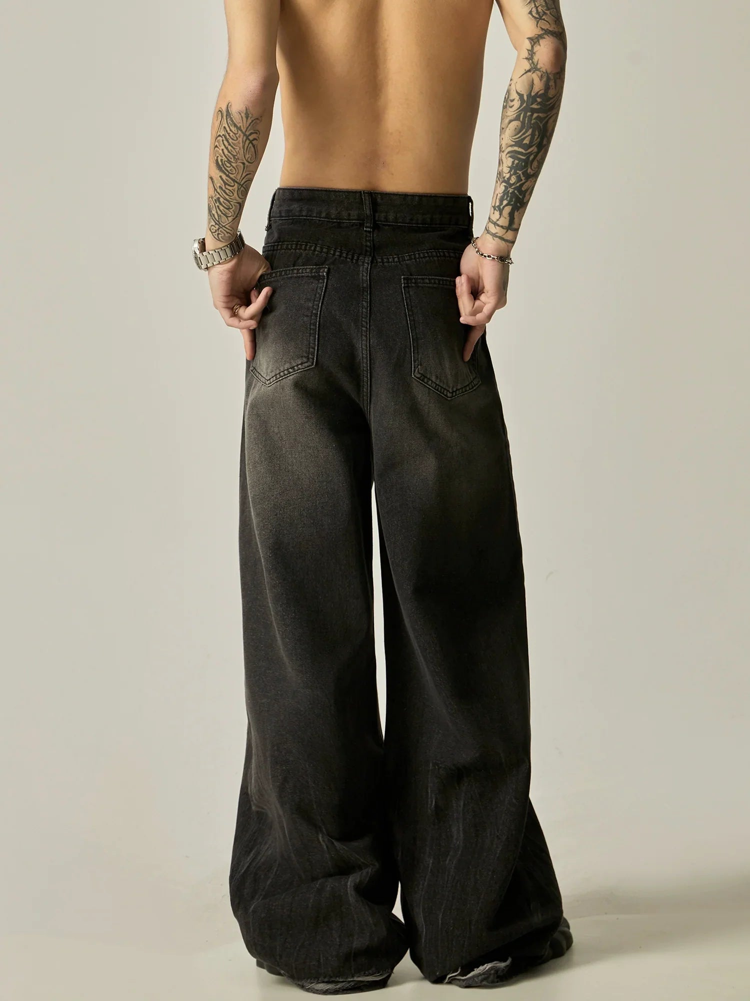 Wide-Leg Faded Black Denim Jeans - sneakershuborg