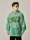 Oversized Mint Green Graffiti Hoodie with Distressed Details sneakershuborg