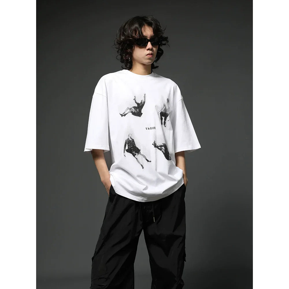 Oversized Black Graphic T-Shirt with Floating Figures Print sneakershuborg