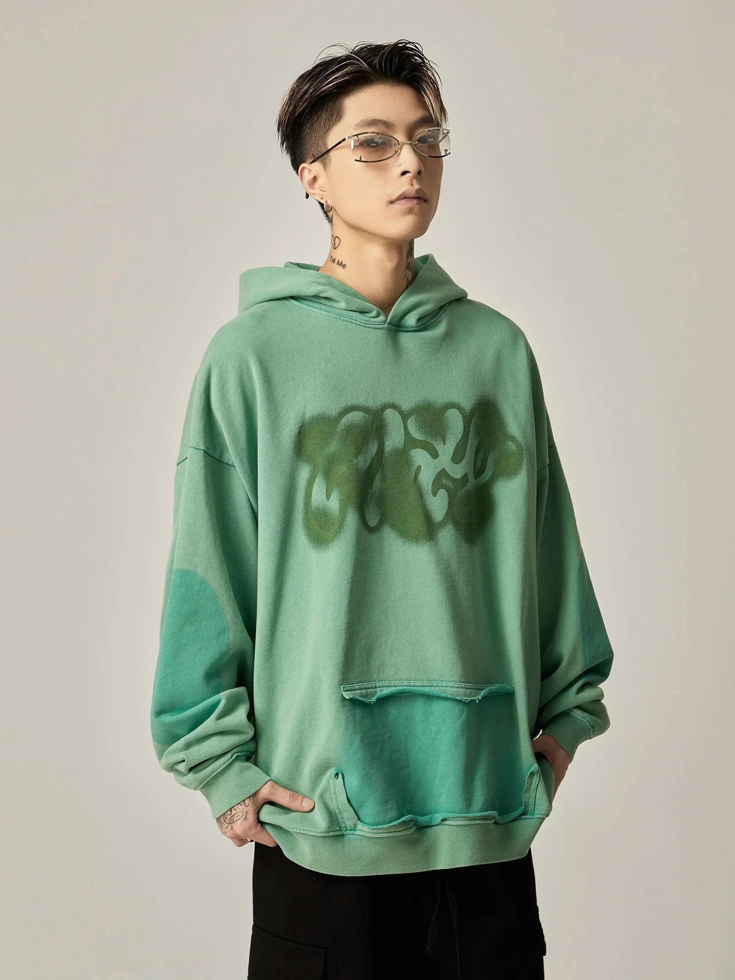 Oversized Mint Green Graffiti Hoodie with Distressed Details sneakershuborg