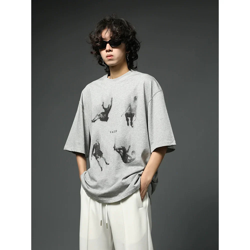 Oversized Black Graphic T-Shirt with Floating Figures Print sneakershuborg