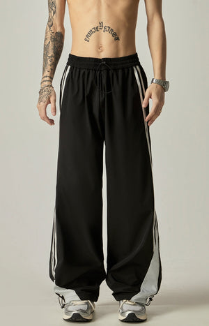 Wide-Leg Triple Stripe Track Pants sneakershuborg